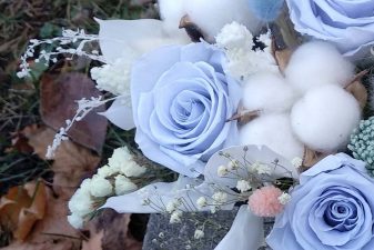 Light blue and pink preserved flower arrangement