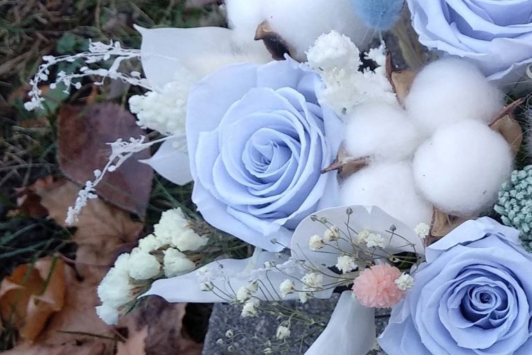 Light blue and pink preserved flower arrangement